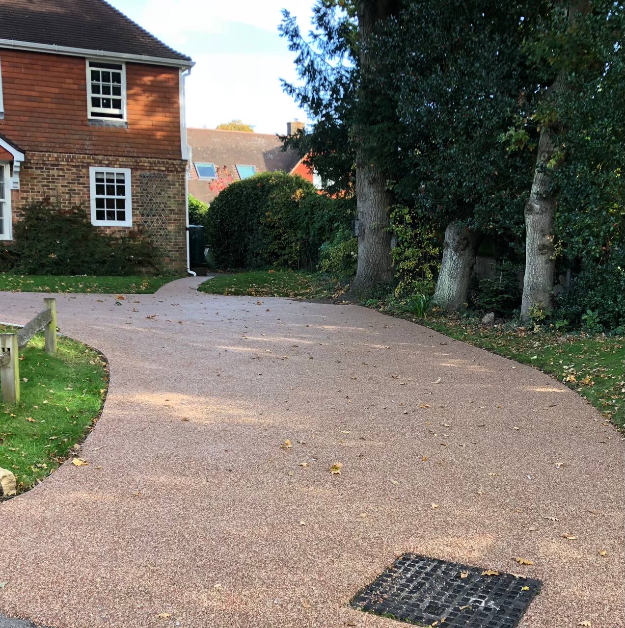 This is a photo of a Resin bound driveway carried out in a district of Wigan. All works done by Resin Driveways Wigan