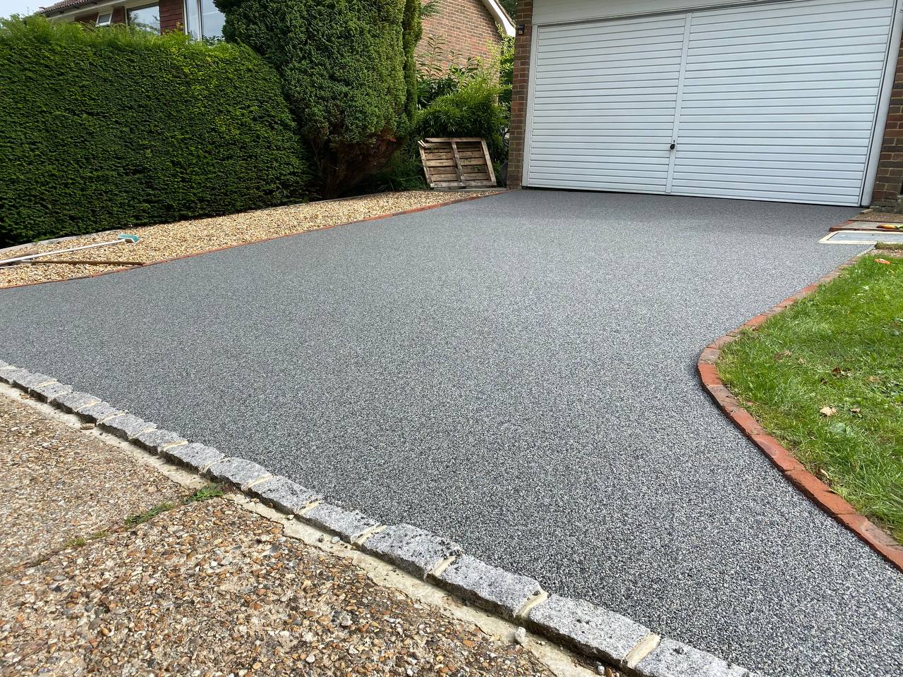 This is a photo of a new resin bound driveway carried out in Wigan. All works done by Resin Driveways Wigan