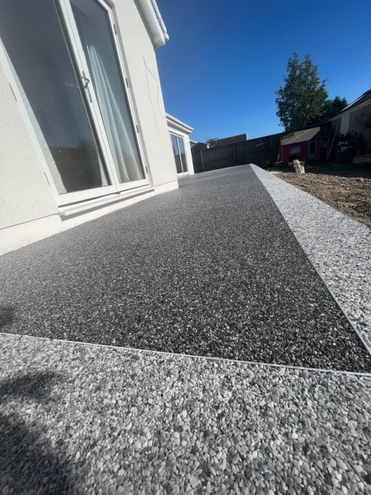 This is a photo of a Resin Bound Patio installed by Resin Driveways Wigan