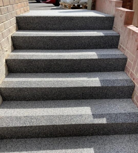 This is a photo of resin bound stairs installed by Resin Driveways Wigan