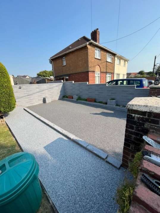 This is a picture of a new grey resin bound path. The work was carried out by Resin Driveways Wigan