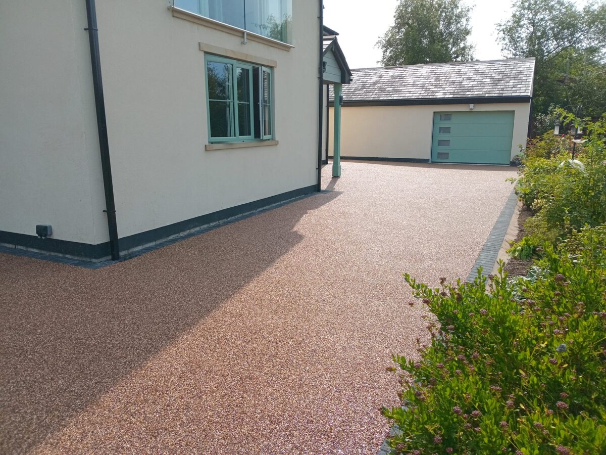 Resin bound driveway installation in natural stone colour in Wigan